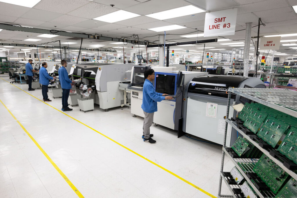 SMT assembly line with automated placement at Foxtronic EMS facility